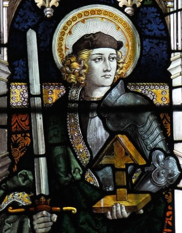 Stained-glass image of Saint Alban the Martyr with sword, armor, halo, and a model church